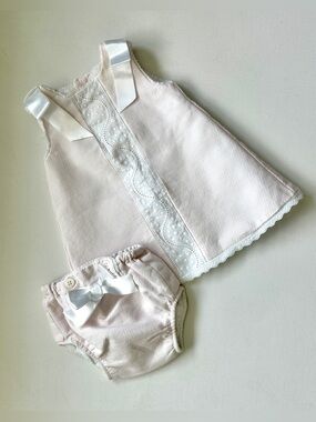 Dulces girl’s pique dress is classic Spanish-style heirloom garment.  Size 0-3M.